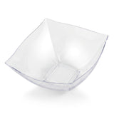 Elegant 16 oz clear wave square disposable plastic bowl, chic and sturdy versatile serving bowl for weddings, parties, and catered events.