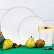 Guests dining on all-white organic plates with neutral table settings.
