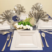Guests enjoyed pastries on Silver Rectangular Dessert Plates at a silver-themed anniversary party