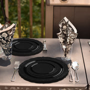 Guests enjoyed steak and pasta on 10" black plates with vintage rims during a formal dinner.
