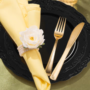 Modern formal dining scene with the Black Vintage Rim Round Disposable Plastic Wedding Value Set adding a dramatic, classy touch