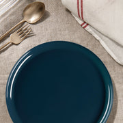 Navy Flat Dinner Plates held steak and vegetables at an elegant evening dinner with deep-toned decor