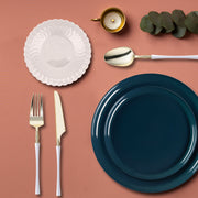 Navy Flat Round Disposable Plastic Tableware Set used for a nautical or evening celebration.