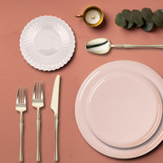 Pink Flat Round Disposable Plastic Tableware Set used at a spring baby shower or bridal brunch.