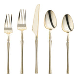 Shiny gold Moderno disposable plastic cutlery set with forks, knives, spoons, dessert forks, and dessert spoons