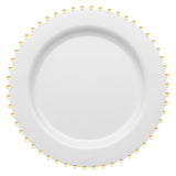 White round disposable plastic dinner plates with a gold pearl string rim