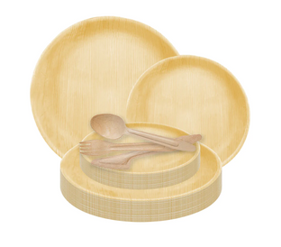 A set of round, tan-colored disposable plates of various sizes made from a natural material. A wooden spoon, fork, and knife are neatly placed on top of the smaller plates, all exhibiting a minimalist and eco-friendly design.