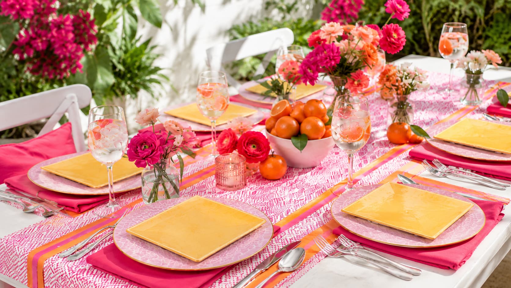 Colorful summer tablescape with disposable dinnerware