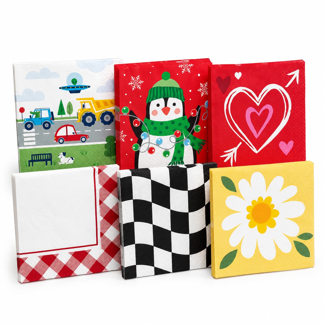 Grouped decorative paper napkins in assorted printed designs on a white background.