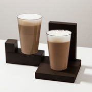 14 oz. Crystal Clear Plastic Disposable Party Cups arranged with other tableware for a coordinated and elegant drink presentation