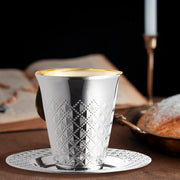 5 oz. Silver Kiddush Cups with metallic finish displayed on a Shabbat table for ceremonial use