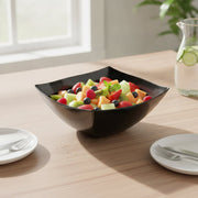 8 oz black wave square plastic bowls styled on a party buffet table, stylish disposable serveware for birthdays, showers, and receptions.