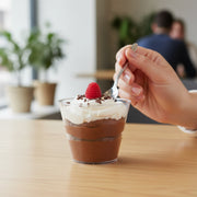 9 oz clear plastic cups, perfect for juice, cocktails, soft drinks, and iced coffee at any event.