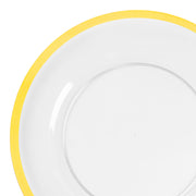 Add upscale elegance to events with 13" clear plastic charger plates featuring a gold rim.