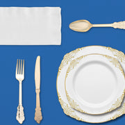 Appetizer and dinner plates, cutlery, wine cups, and napkins labeled with SKU codes from the complete party bundle.