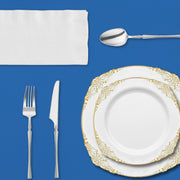 Appetizer and dinner plates, cutlery, wine cups, and napkins labeled with SKU codes from the complete party bundle