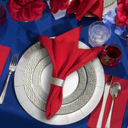 Beautiful dining scene with the White with Silver Hammered Rim Round Plastic Wedding Value Set adding elegance to any formal event