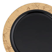 Black disposable plastic appetizer plates with a gold marble rim