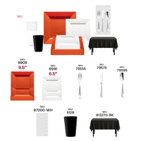 Black tablecloth and tumblers accent the NFL-themed dinnerware with strong color contrast.