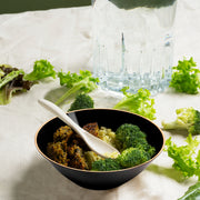 Black with Gold Rim Organic Round Disposable Plastic Dessert Bowl (6 oz.) filled with a hearty serving of broccoli, rice, and savory meat
