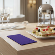 Bold purple paper dinner napkin perfect for celebrations and themed events, 16 x 16 inches, sold in 600 count