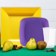 Bold yellow dinner plates and purple salad plates for energetic sports-themed parties.