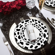 Bring an exciting and unique atmosphere to your special day with the White with Black Dalmatian Spots Round Disposable Plastic Wedding Value Set, adding a fun twist to your event