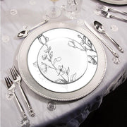 Bring classic beauty to your event with the White with Silver Antique Floral Round Disposable Plastic Wedding Value Set, perfect for an elegant and luxurious table setting