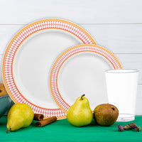 Capture autumn’s beauty with The Friendsgiving Forever Set’s white plates, gold rims, and seasonal accents.