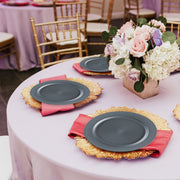 Charcoal gray salad plates paired with gold utensils and candles for a contemporary look