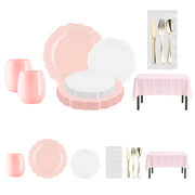 Charming baby shower dinnerware set with pearl pink and white plates, gold cutlery, pink tablecloth, and elegant stemless cups.