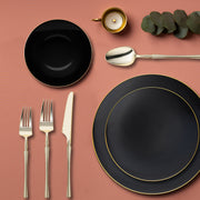 Chic Black with Gold Organic Tableware set for a luxury black-tie dinner.