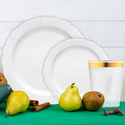 Classic white vintage plates styled with delicate pastel accessories.