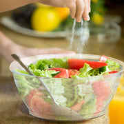 Clear Floral Round Disposable Plastic Dessert Bowl (6 oz.) showcasing a vibrant mix of fresh lettuce and ripe tomato slices