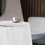 Clear Plastic Tablecloths protected surfaces while displaying decor underneath.