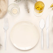 Clear medium heavy weight cutlery set arranged on a catered dinner table, coordinated disposable flatware for elegant entertaining and easy cleanup.

