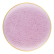 Clear pink round plastic dinner plates with a decorative gold hammered rim