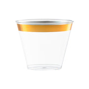 Clear plastic cups with a metallic gold rim, 9 oz, adding a touch of elegance to upscale gatherings and cocktail parties