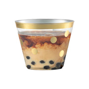 Clear plastic disposable cups with an intricate gold dot design, 9 oz size, round shape