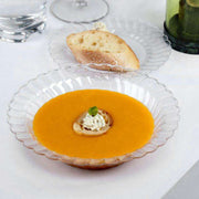 Clear plastic soup bowls with a flared edge design, 12 oz., in a bulk pack of 180, ideal for events and parties