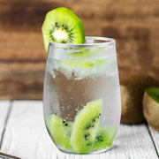 Clear plastic wine glasses with elegant silver rim displayed on a chic evening gathering table
