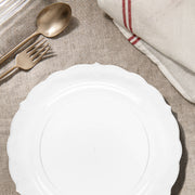 Clear round disposable plastic appetizer or salad plates with a vintage design, 7.5-inch diameter, perfect for events