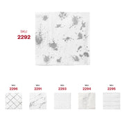 Close-up of white paper cocktail napkin with silver splatter, SKU 2292 clearly visible, part of 600-napkin case