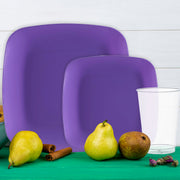 Complete sports dinnerware set in purple, white, and green for vibrant team celebrations.