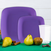 Complete sports dinnerware set in purple, white, and green for vibrant team celebrations.