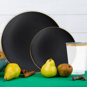 Coordinated set includes tablecloths, tumblers, and ivory napkins for a polished sports-inspired table.