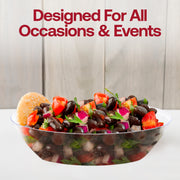 Crisp garden salad served in a crystal clear oval disposable bowl, elegant and practical tableware for outdoor events and luncheons.