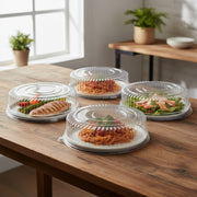 Designed to fit standard 12-inch round plastic trays, these clear domed lids offer extra height for tall garnishes and displays