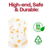 Disposable, BPA-free white dinner napkins with metallic gold splatter design, combining safety and upscale aesthetics