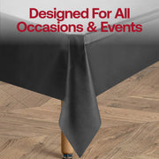 Disposable black plastic tablecloth in a rectangular 54 x 108 size, ideal for easy cleanup after events and parties.